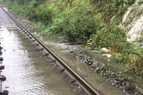 Water pouring onto the track between Wigan and Southport