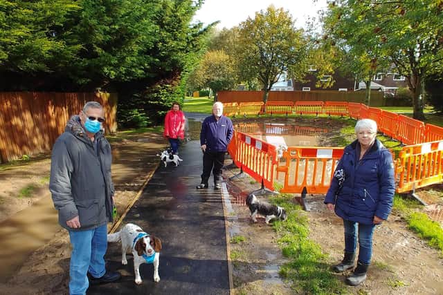 Carleton residents James Baldwin, Emma Gray, Warren Cook and Irene Thompson were furious with the work carried out to minimise flooding by Wyre Council on Farnham Way park.