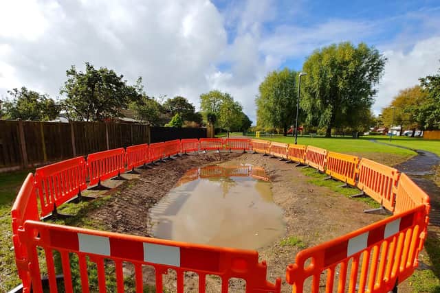 Wyre Council has now fenced off the holes its contractors dug in the ground on Farnham Way park, but residents say there were no safety precautions in place for two weeks.