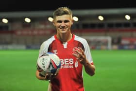 Harvey Saunders with the match ball after his hat-trick against Aston Villa Under-21s