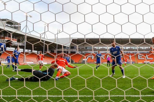 Neil Critchley praised the performance of striker Gary Madine, here scoring Blackpool's consolation goal against Ipswich