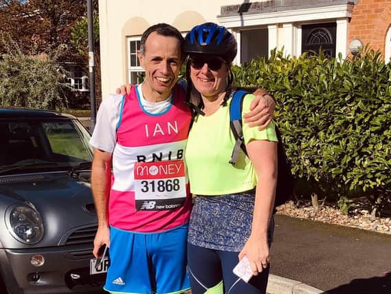 Ian Conuel, who ran the virtual London marathon from his home in Lytham, with wife Annette Conuel, who cycled alongside him