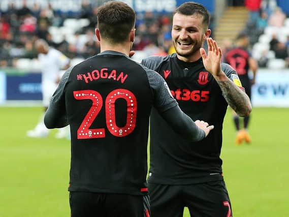 Tom Edwards (right) celebrates with Scott Hogan playing for Stoke City last seson.
