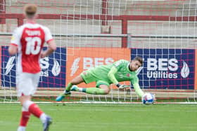 Fleetwood Town goalkeeper Jayson Leutwiler makes a save from Harry Anderson    Picture: Matt Wilkinson/PRiME Media Images Limited