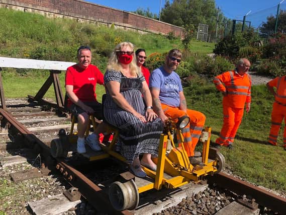 Coun Mary Stirzaker, pictured centre with fellow councillors and PWRS members on a mini train at Thornton,wants to ensure the Fleetwood to Poulton rail link issue is not forgotten.
