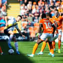 Ben Woodburn on the ball against Blackpool while on loan at Oxford last season
