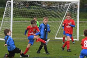 Under-9 action between FC Rangers and Kirkham Juniors Lightning Picture: NEIL CROSS