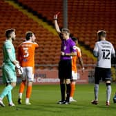 Blackpool saw James Husband sent off early on during Tuesday's match with Charlton Athletic