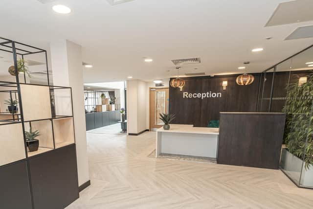The housing project's airy and modern reception area