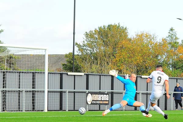 Jordan Hulme makes no mistake to open the scoring for Fylde against Altrincham
Picture: STEVE MCLELLAN