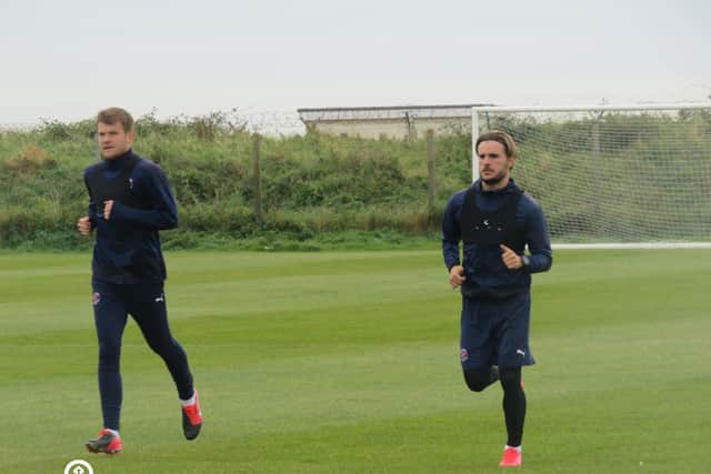 Luke Garbutt, right, remains sidelined with a hamstring injury