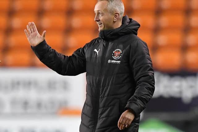 Neil Critchley all smiles at the final whistle