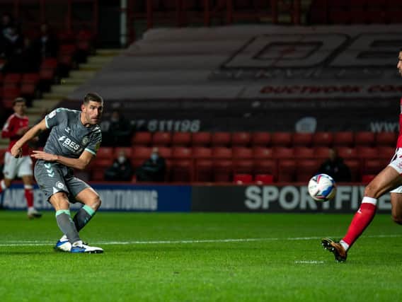 Ched Evans scores the first of his two goals at Charlton