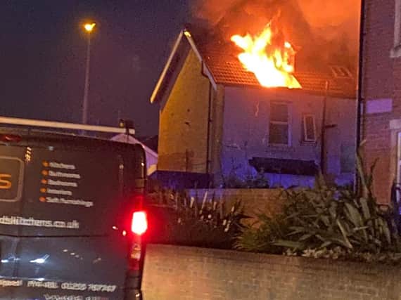 Flames burst through the roof of the property (Photo: 'imJustJamieT)