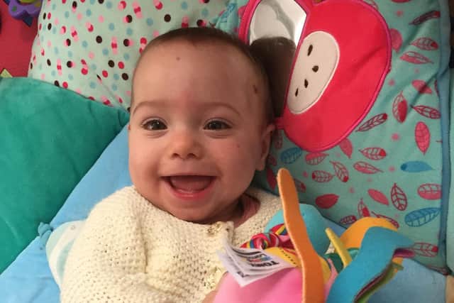 12-month-old Scarlett Steeden-Smith was born prematurely with her twin sister Beatrix, and now her childminder Lynn Taylor is hoping to raise enough money to buy a Galileo machine to help with her muscle development.
