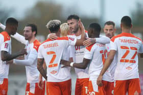 Blackpool booked their FA Cup second round spot with victory at Eastbourne Borough