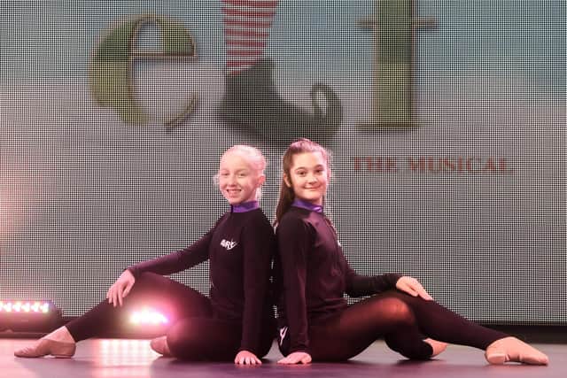 Two of the young dancers in the Elf production