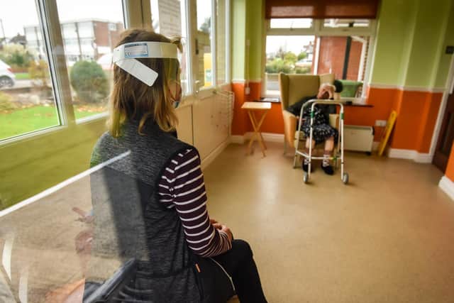 The visiting room allows self distancing measures for family visits