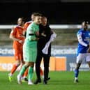 Blackpool boss Neil Critchley with Chris Maxwell after the game
