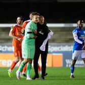 Blackpool boss Neil Critchley with Chris Maxwell after the game