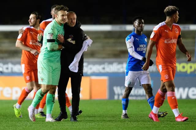 Blackpool boss Neil Critchley with Chris Maxwell after the game