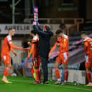Ethan Robson, Keshi Anderson and Ben Woodburn were all introduced at the same time during Blackpool's win at Peterborough on Saturday