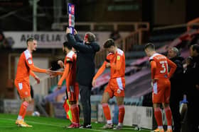 Ethan Robson, Keshi Anderson and Ben Woodburn were all introduced at the same time during Blackpool's win at Peterborough on Saturday