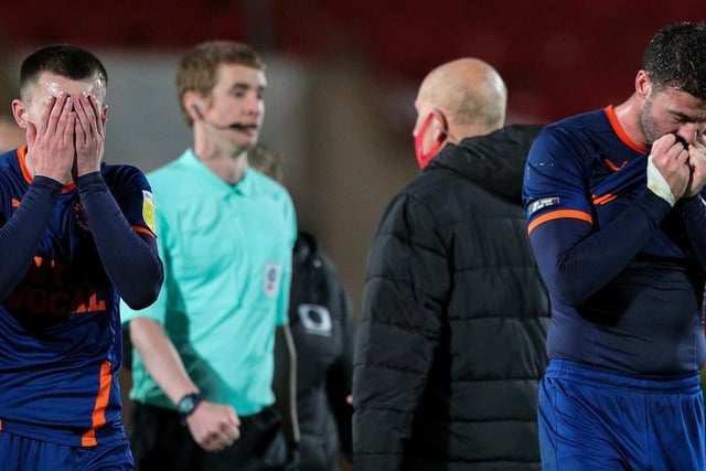 Ben Woodburn and Gary Madine can't hide their disappointment at the full-time whistle