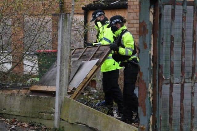 Officers search for weapons as part of Operation Sceptre.