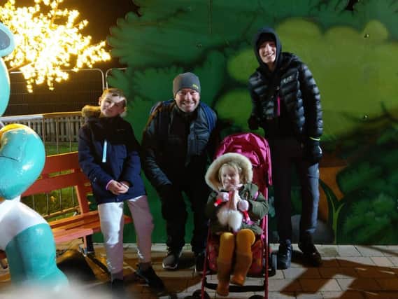 Simon Moore with children Harvey, 13, Rome, eight, and three-year-old Ada walked the Lights for Rosemere Cancer Foundation