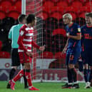 Kenny Dougall looks shocked to concede a penalty at Doncaster