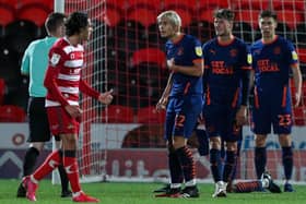 Kenny Dougall looks shocked to concede a penalty at Doncaster