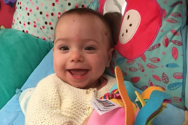 12-month-old Scarlett Steeden-Smith now has a new Galileo plate and money for extra therapies and equipment thanks to a successful fundraiser organised by her doting childminder, Lynn Taylor from Cleveleys.