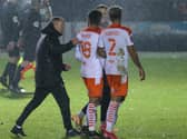 Neil Critchley congratulates his Blackpool players after the FA Cup win at Harrogate