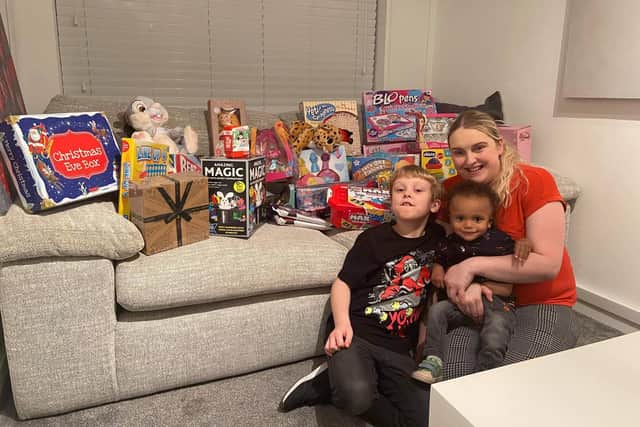 Kelly Smith with nine-year-old Lewis and baby Theo have had a great response to their toy appeal