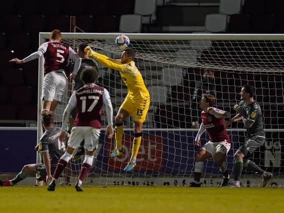 Cian Bolger heads the Cobblers' winner against his former club