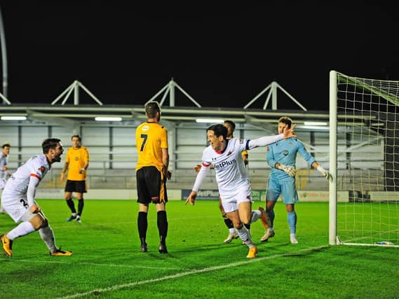 Luke Conlan scores Fylde's third against Bradford (Park Avenue) but there was a late twist at Mill Farm Picture: STEVE MCLELLAN