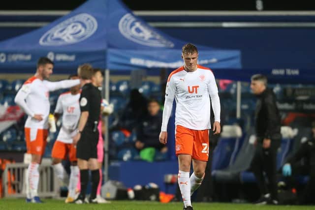 Ballard trudges off the pitch after being sent off in Blackpool's defeat at Wimbledon