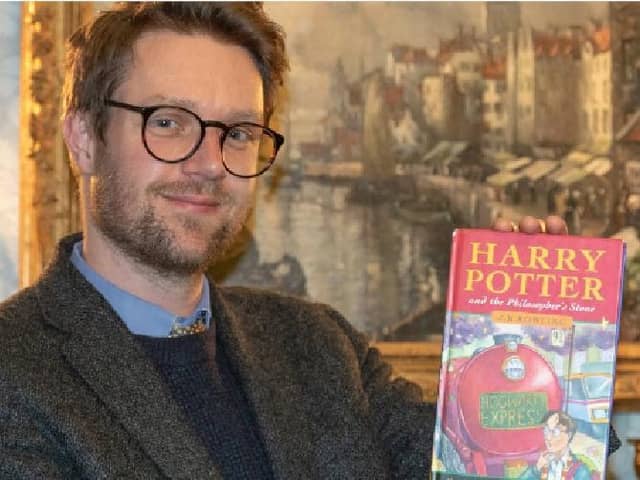 Hansons’ books expert Jim Spencer with the first edition of Harry Potter and the Philosopher’s Stone is set to be auctioned in December 2020 and could fetch £50,000