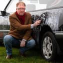 Darren Abey with his latest addition to his fleet, a special armed forces hearse. Photo: Kelvin Stuttard