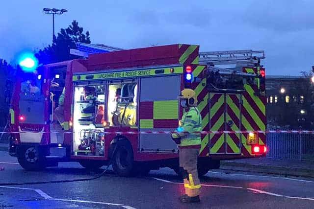 Emergency services, including two fire engines and ambulance crews, are at the scene