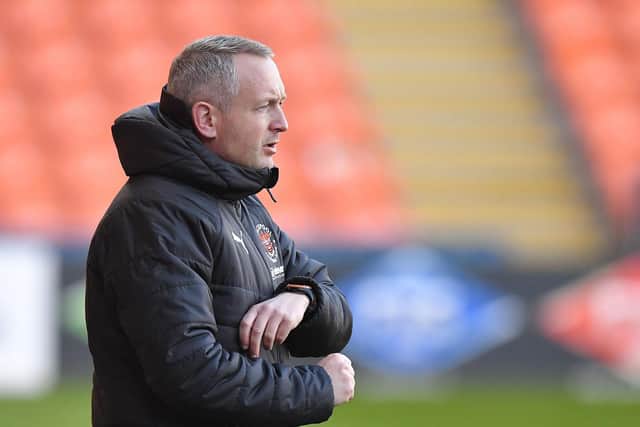 Neil Critchley has revealed his approach to managing players who aren't in his side