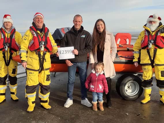 From left, Gary Randles (RNLI)   Coxswain Tony Cowell, Liam Barnes, wife Laura and daughter Darcey and Brian Blundell (RNLI)
