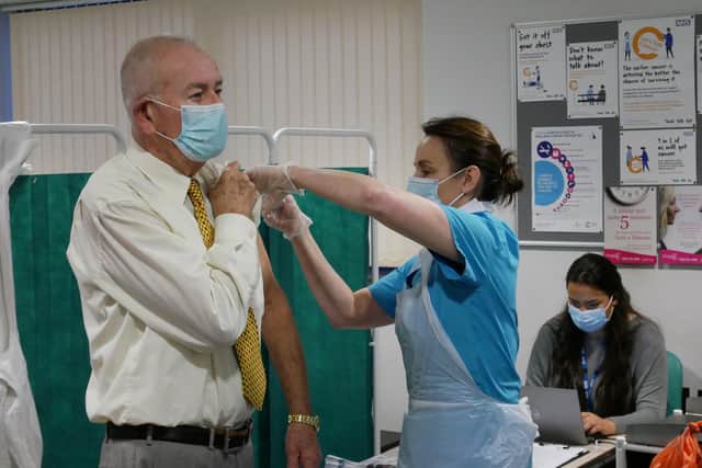 David Bradbury receives a vaccine in Lytham from Dr Ruth Mason