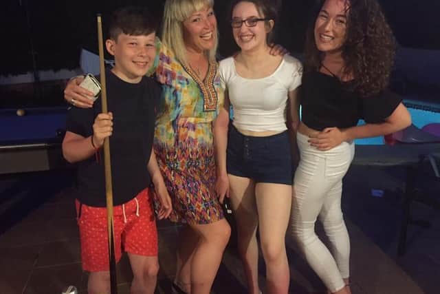 Jane Ireland, second from left, with her children Holly, Macy and Marshall Metcalfe