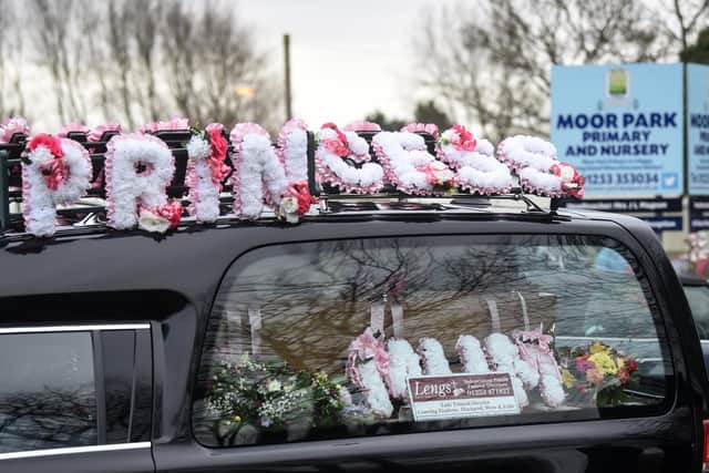 The funeral car carrying Cath Strangwood's coffin, adorned with flowers, showed onlookers she was a much loved Mum, Grandma and "Princess," to husband Andrew. Photo: Daniel Martino for JPI Media