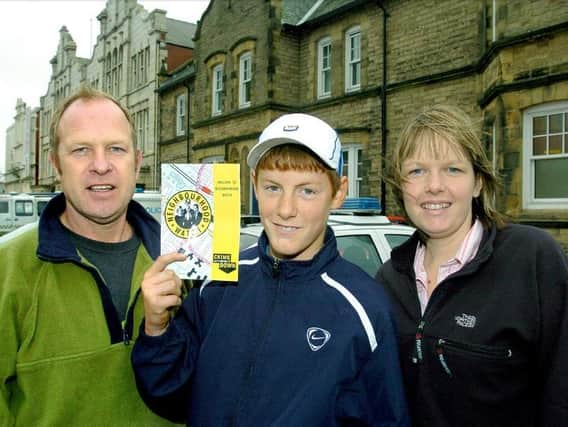Liam in his youth, handing out Neighbourhood Watch leaflets with PC Paula Robertson and Mark Smith of the Youth Offending Team, Wyre and Fylde