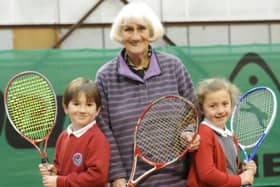 Coun Lily Henderson with young tennis players