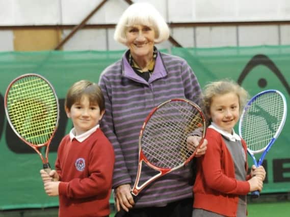 Coun Lily Henderson with young tennis players
