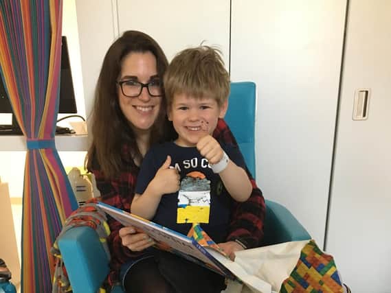 Clare Law with son Austin in hospital